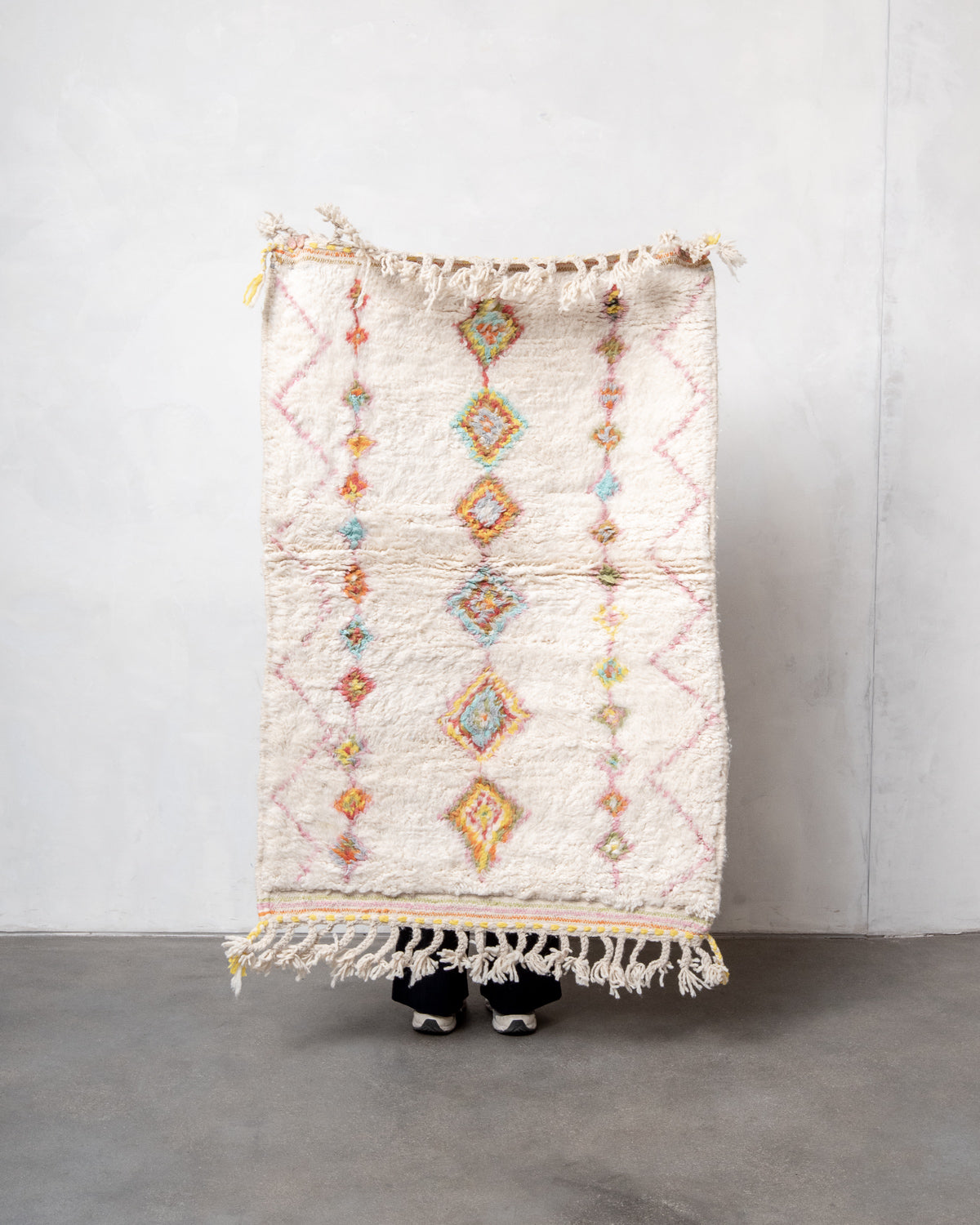 Modern, designer, handcrafted Berber rug from Morocco. Beniourain carpet with beautiful colours and patterns and fluffy wool texture.
